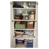 Contents of kitchen cabinet with cookbooks