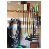 Hose, long handle tools, folding chair