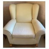 White upholstered wingback rocker