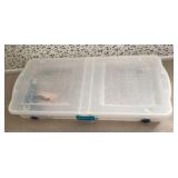 Underbed storage tote with contents