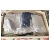Box of sheets and fabric