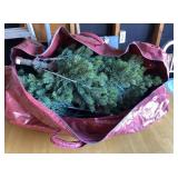 Pre-lit Christmas tree in storage bag