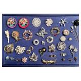 Costume jewelry brooches and pins