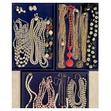 Costume jewelry necklaces and earrings
