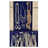 Costume jewelry necklaces and earrings