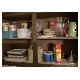 Contents of upper cabinet with glass pitcher