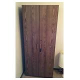 Cabinet with sewing supplies