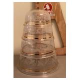 Set of 4 glass nesting bowls with gold trim