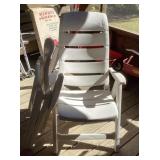 2 folding plastic patio chairs