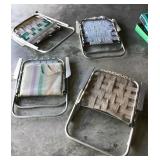 Four folding lawn chairs