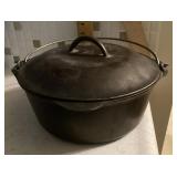 Cast iron Dutch oven with lid and trivet
