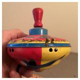 Tin litho toy top with outer space design