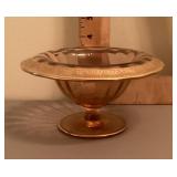 Pink Depression glass compote with gold trim