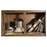 Bakeware, etc. in upper cabinet