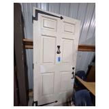 Vintage Style Paneled Door with Ornate Hardware