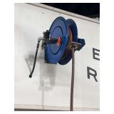 Blue spring driven hose reel