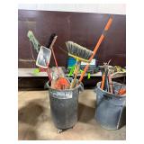 Trash Bin with Brooms and Signs