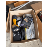 lot of Wii games, flashlight, and accessories