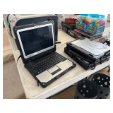 Three Panasonic computers