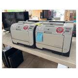 Two HP Color LaserJet printers.