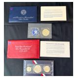 Lot - (2) Eisenhower Uncirculated Silver Dollars in Original Packaging - (1) 1974 and (1) 1776-1976 Bicentennial Set