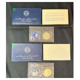 Lot - (2) Eisenhower Uncirculated Silver Dollars in Original Packaging - 1973 and 1974