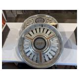 I said a four 1960s 14 inch Chevy II  SS hubcaps