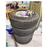One set of four general motors three-quarter ton 8 aluminum wheels and tire tires