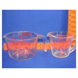 2 Pyrex Measuring Cups