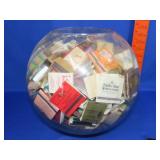 Glass Vase Full of Match Books