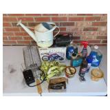 Table Lot of Cleaner. ATV Cover, Watering Can