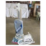 Two Oreck Vacuum Cleaners