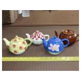 Four Small Tea Pots