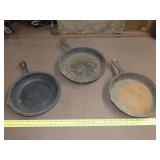 Three Cast Iron Skillets