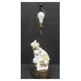 Vintage figural brass & porcelain table lamp.
