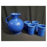 Group of vintage fiesta blue carafe with 4 cups