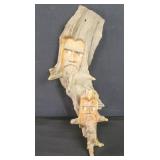 Pair of vintage carved wood wall masks