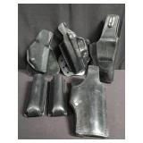 Group of leather holsters