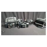 Group of vintage cameras, Vivitar, Polaroid, etc.