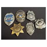 Group of movie prop badges
