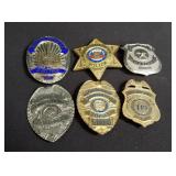 Group of movie prop badges