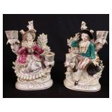 Pair of porcelain figural candle holders