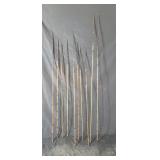 Group of ten native wood spears