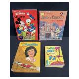 Group of vintage cartoon books and Disney diary