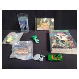 Group of toy cars, figurine, glass cup, post