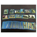 Group of vintage Star Wars collectible cards in