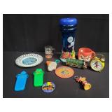 Group of pins, disney clock, key chain, and plate