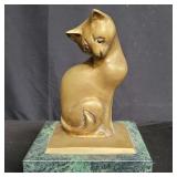 Vintage brass cat figurine on marble base