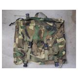 Group of vintage aviation jumpsuits and backpack