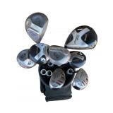 Lot of golf drivers and golf bag
